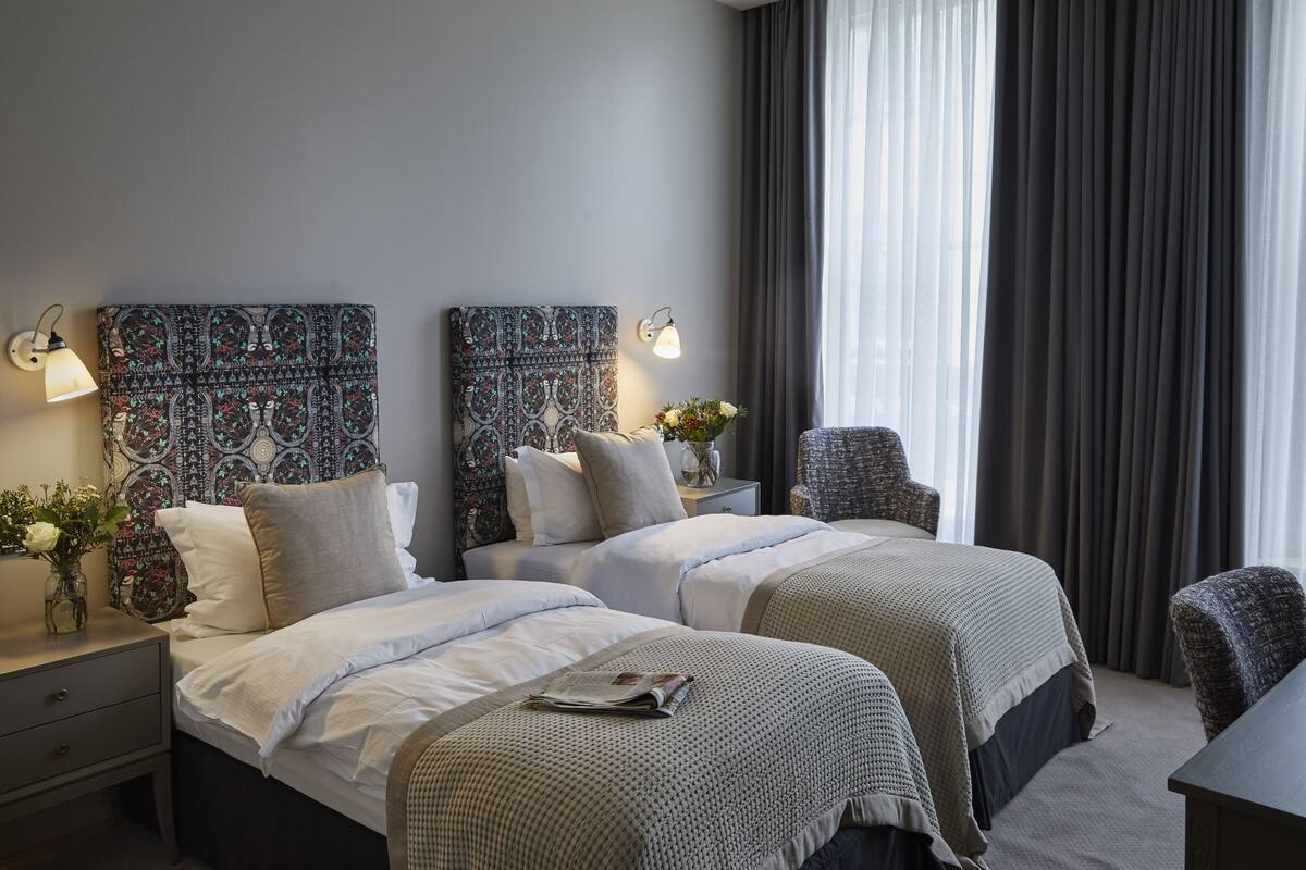Premium bedding, memory foam beds, minibar, desk