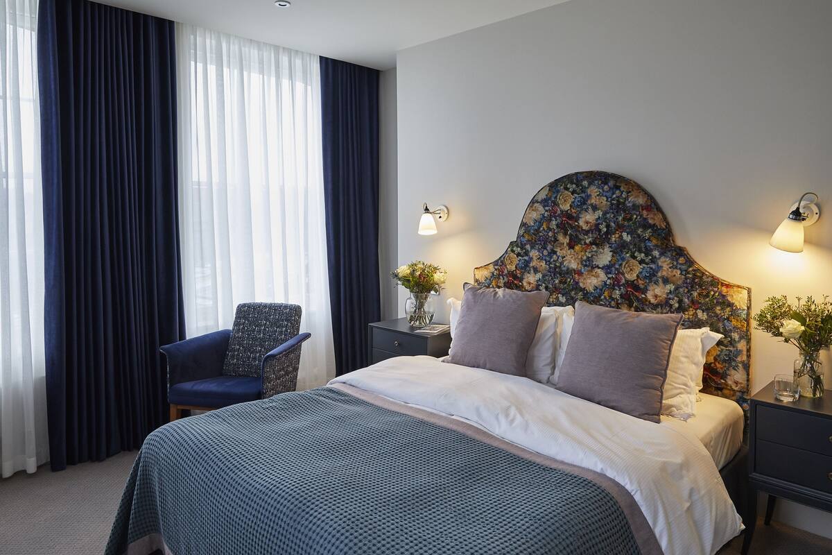 Premium bedding, memory foam beds, minibar, desk