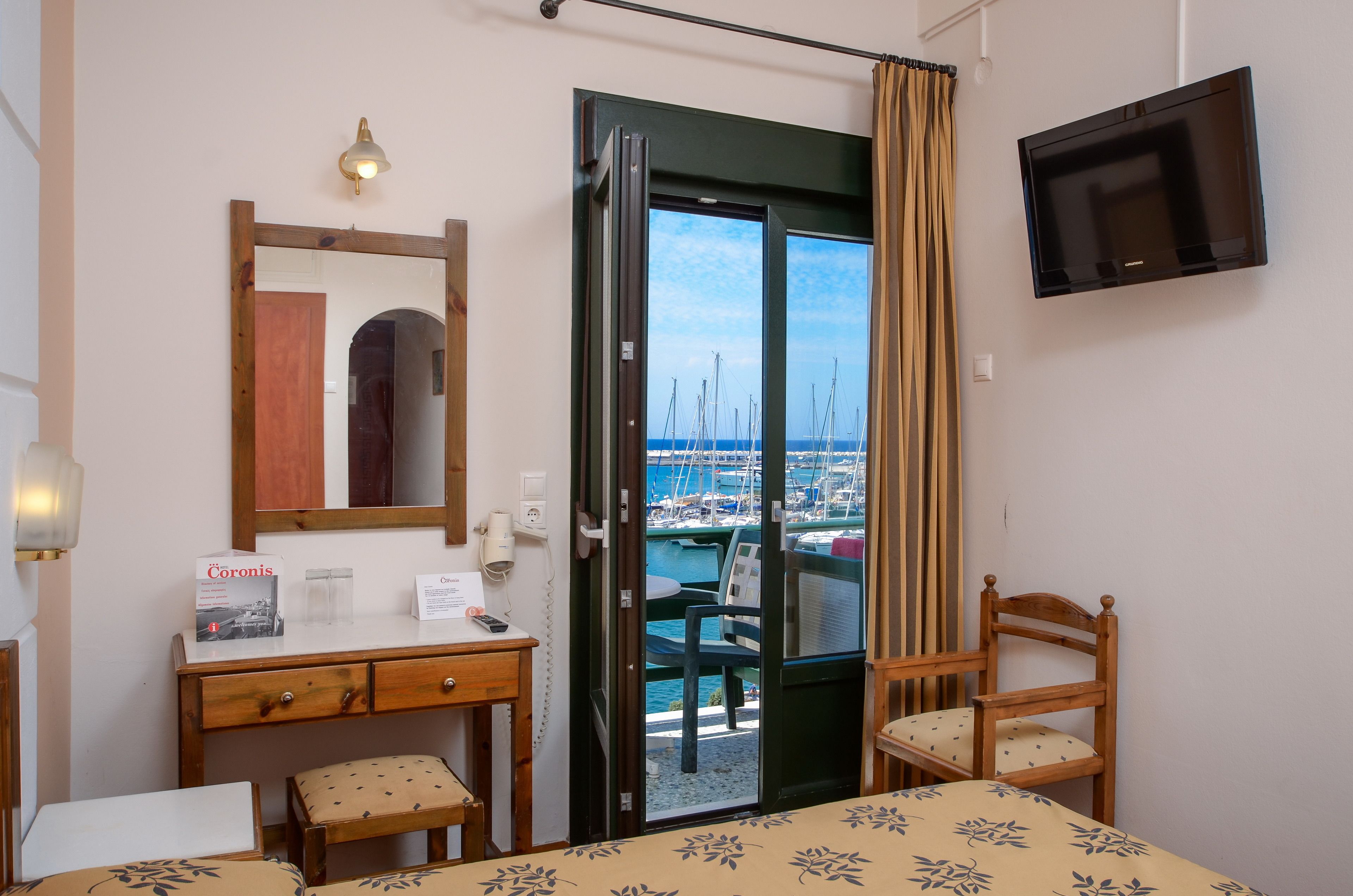 standard twin room (port view) | 1 bedroom, down duvets, desk, iron/ironing board