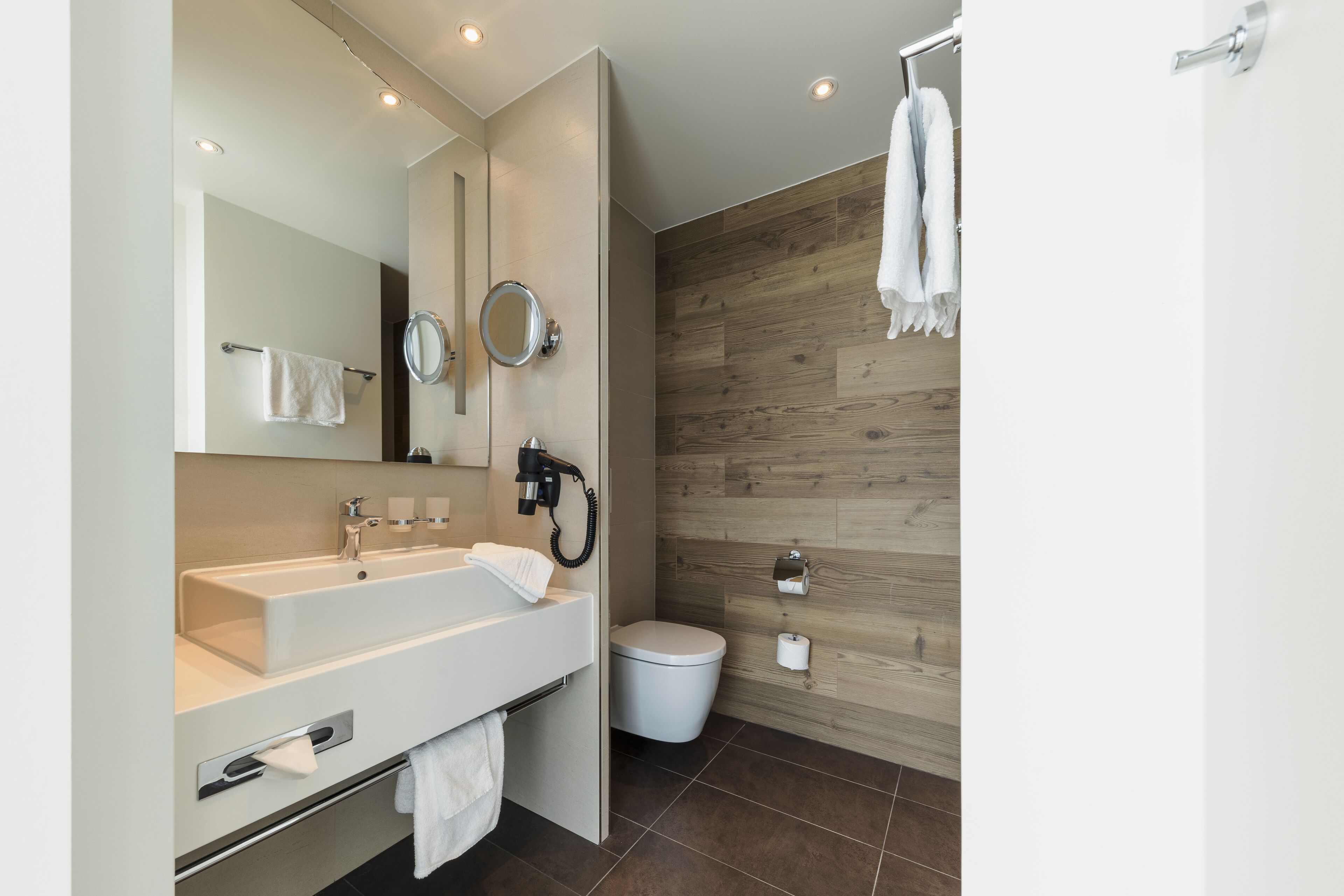 shower, rainfall showerhead, hair dryer, towels