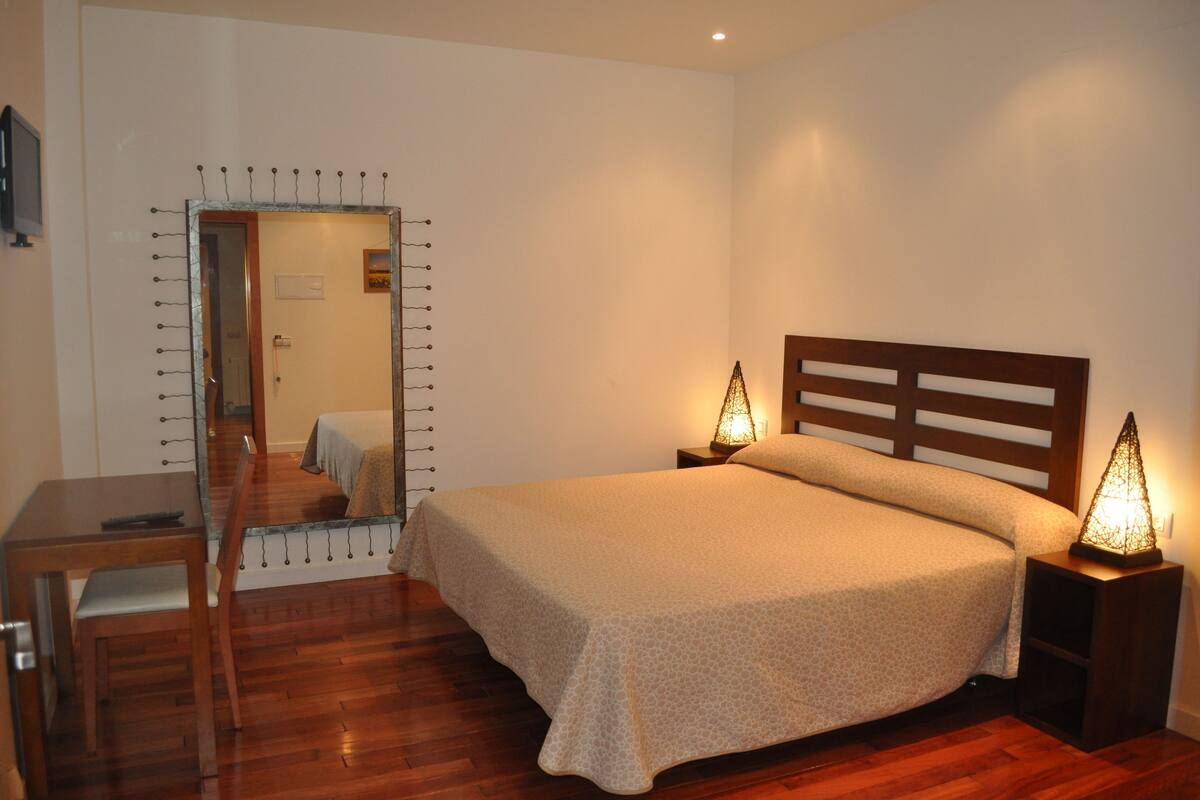 Premium bedding, desk, blackout curtains, soundproofing