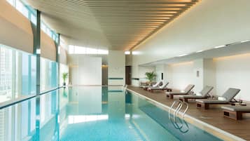 Indoor pool, open 6 AM to 10 PM, sun loungers, lifeguards on site