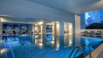 Indoor pool, outdoor pool, open 7:00 AM to 7:00 PM, pool umbrellas
