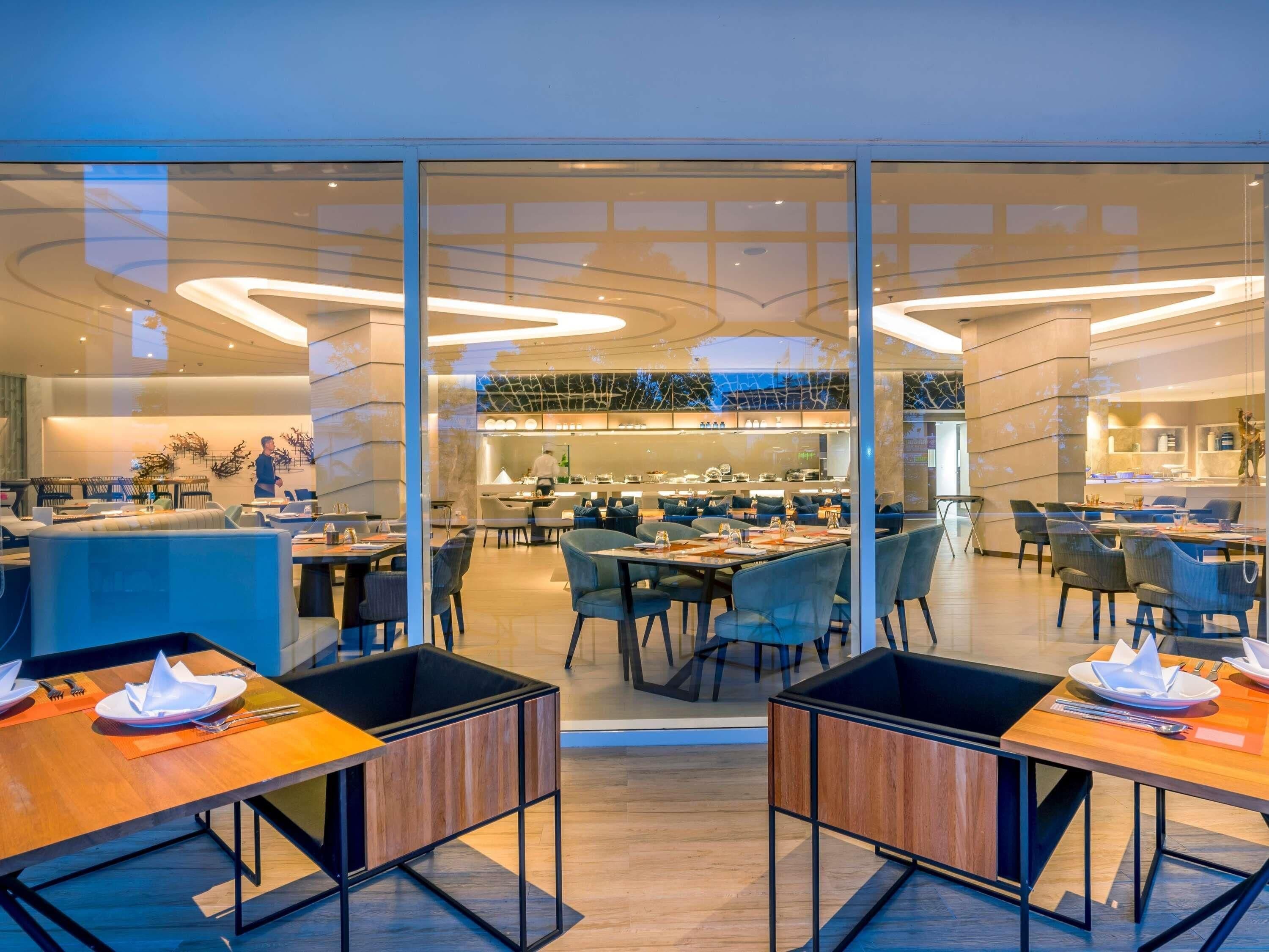 Breakfast, lunch served; local and international cuisine, garden views 