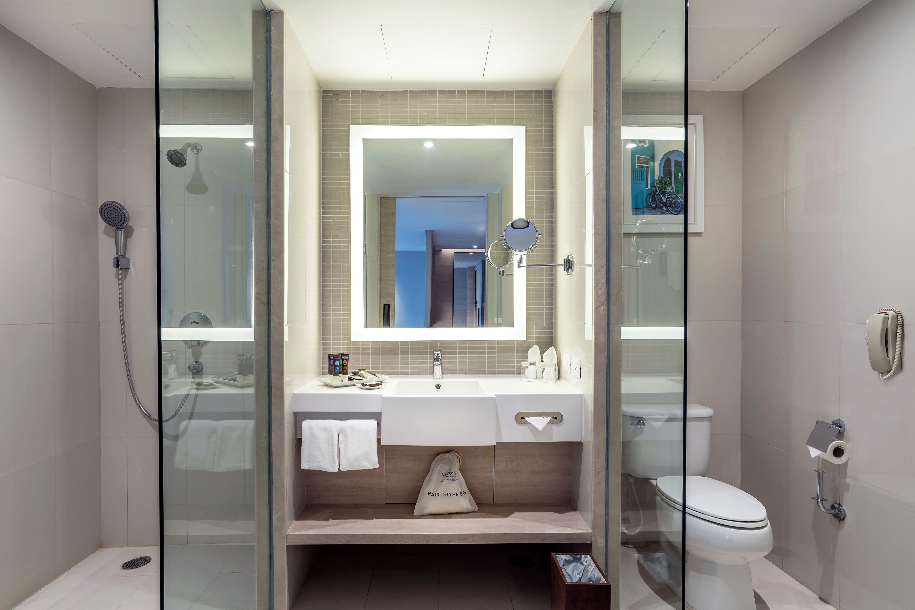 eco-friendly toiletries, hair dryer, bathrobes, slippers