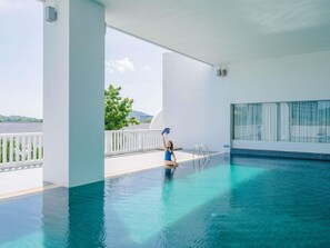 Indoor pool, outdoor pool, open 7:00 AM to 7:00 PM, pool umbrellas