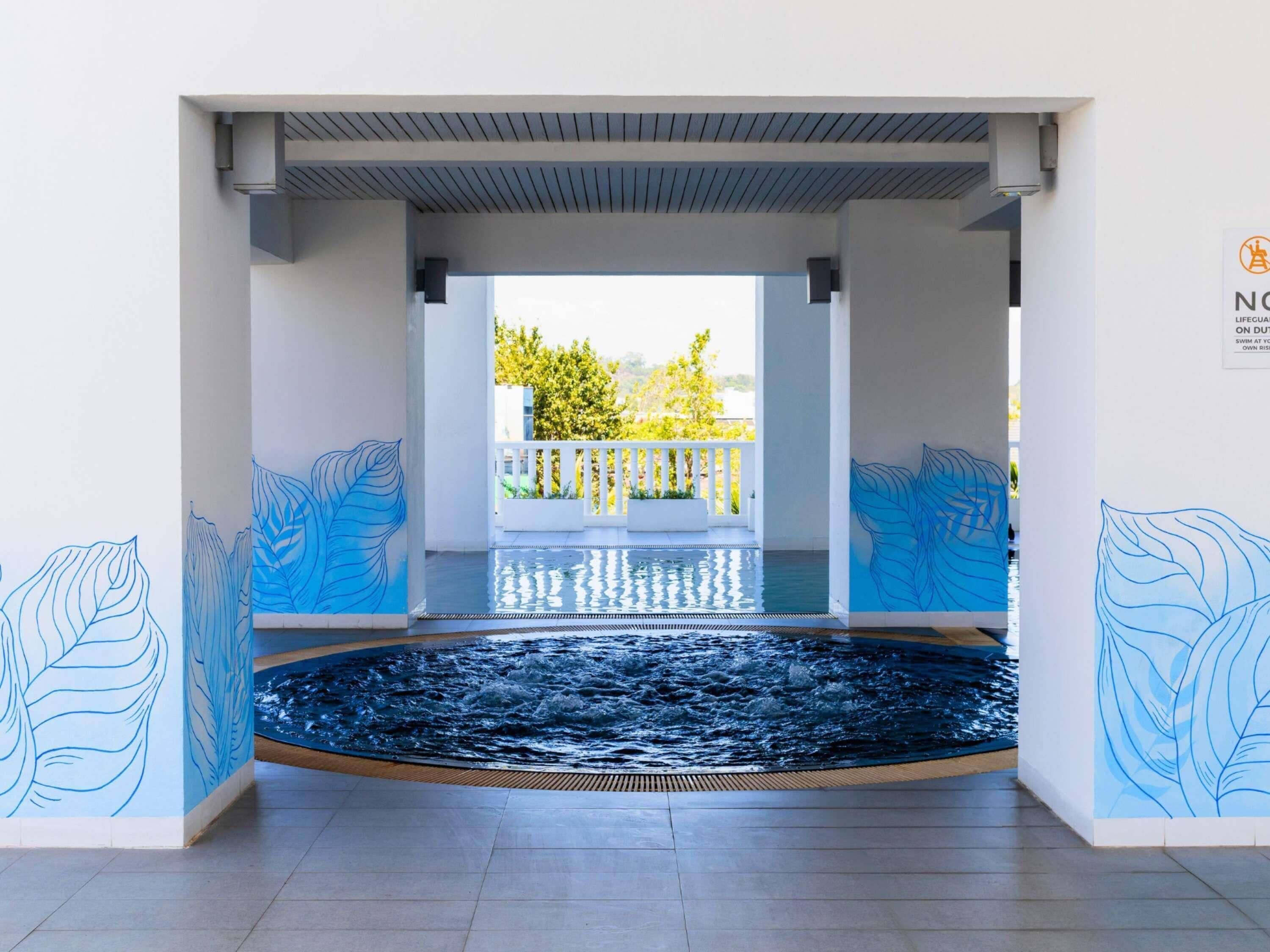 Indoor pool, outdoor pool, open 7:00 AM to 7:00 PM, pool umbrellas