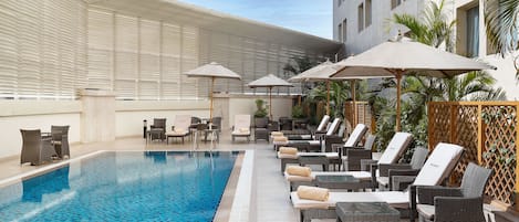 Outdoor pool, pool cabanas (surcharge), pool loungers