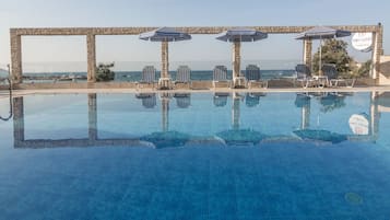 Outdoor pool, pool umbrellas, pool loungers