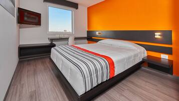 Desk, blackout drapes, soundproofing, free WiFi