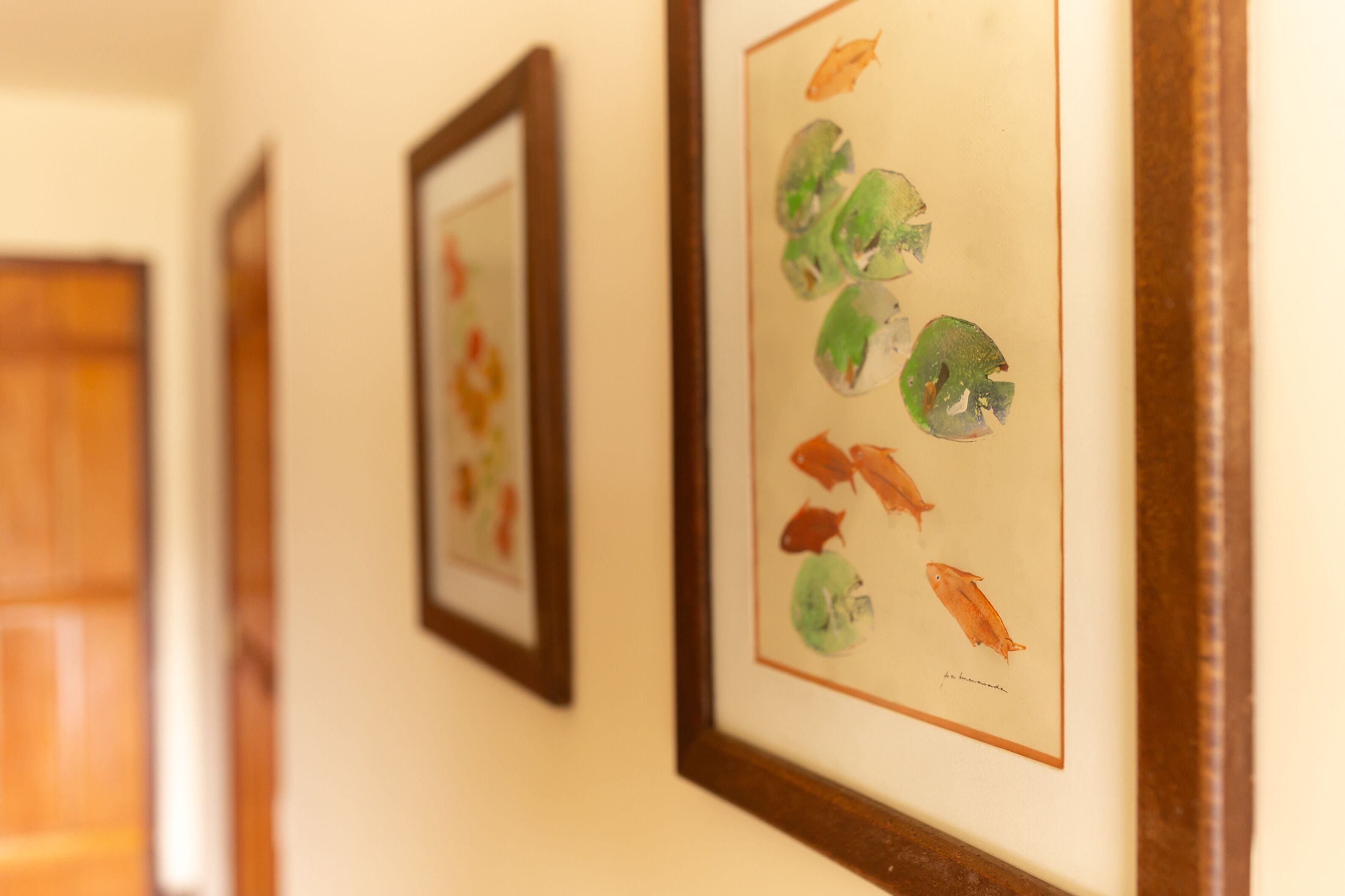 Framed artwork on a wall.