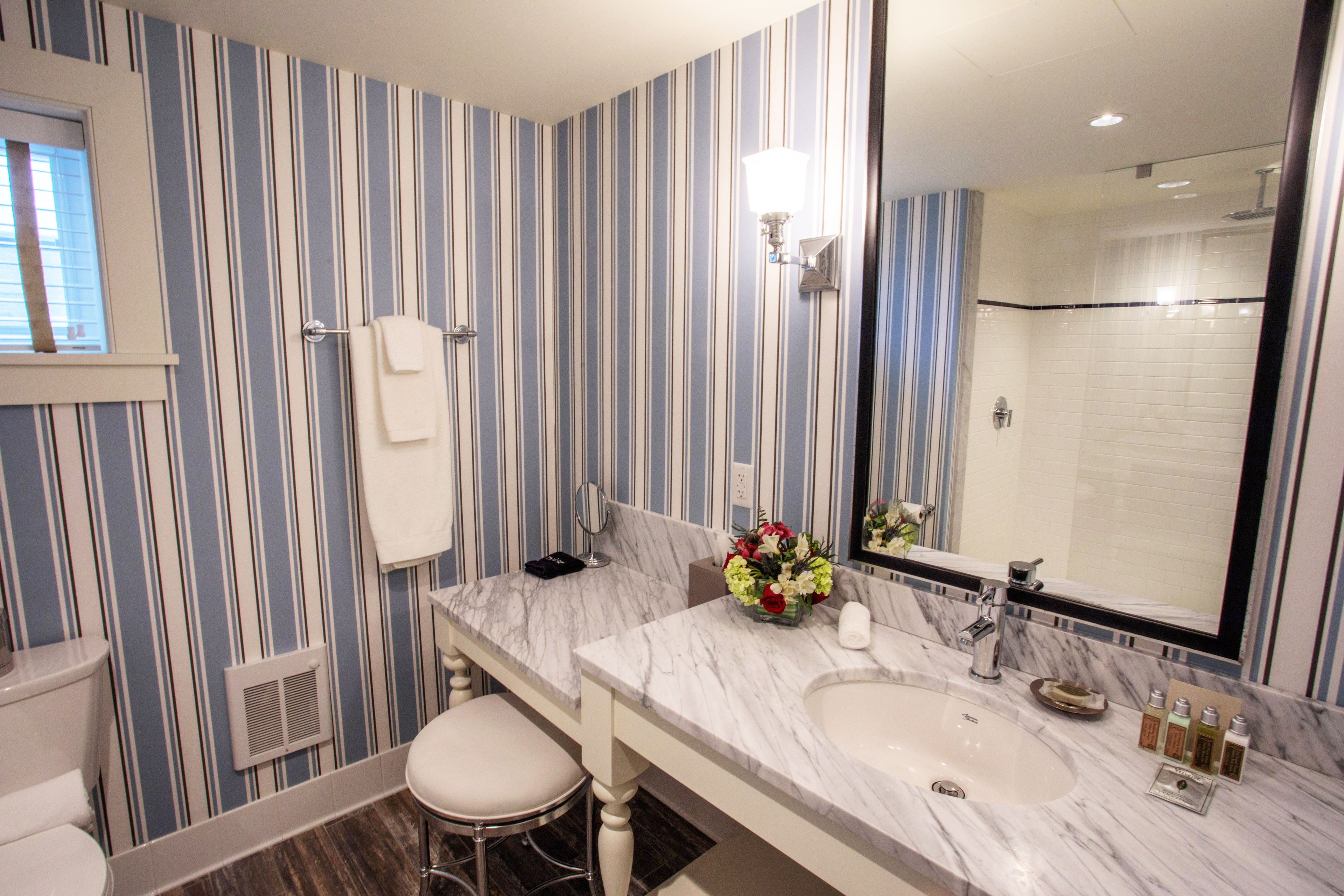 ocean front jr. king suite with balcony | bathroom | free toiletries, hair dryer, bathrobes, slippers