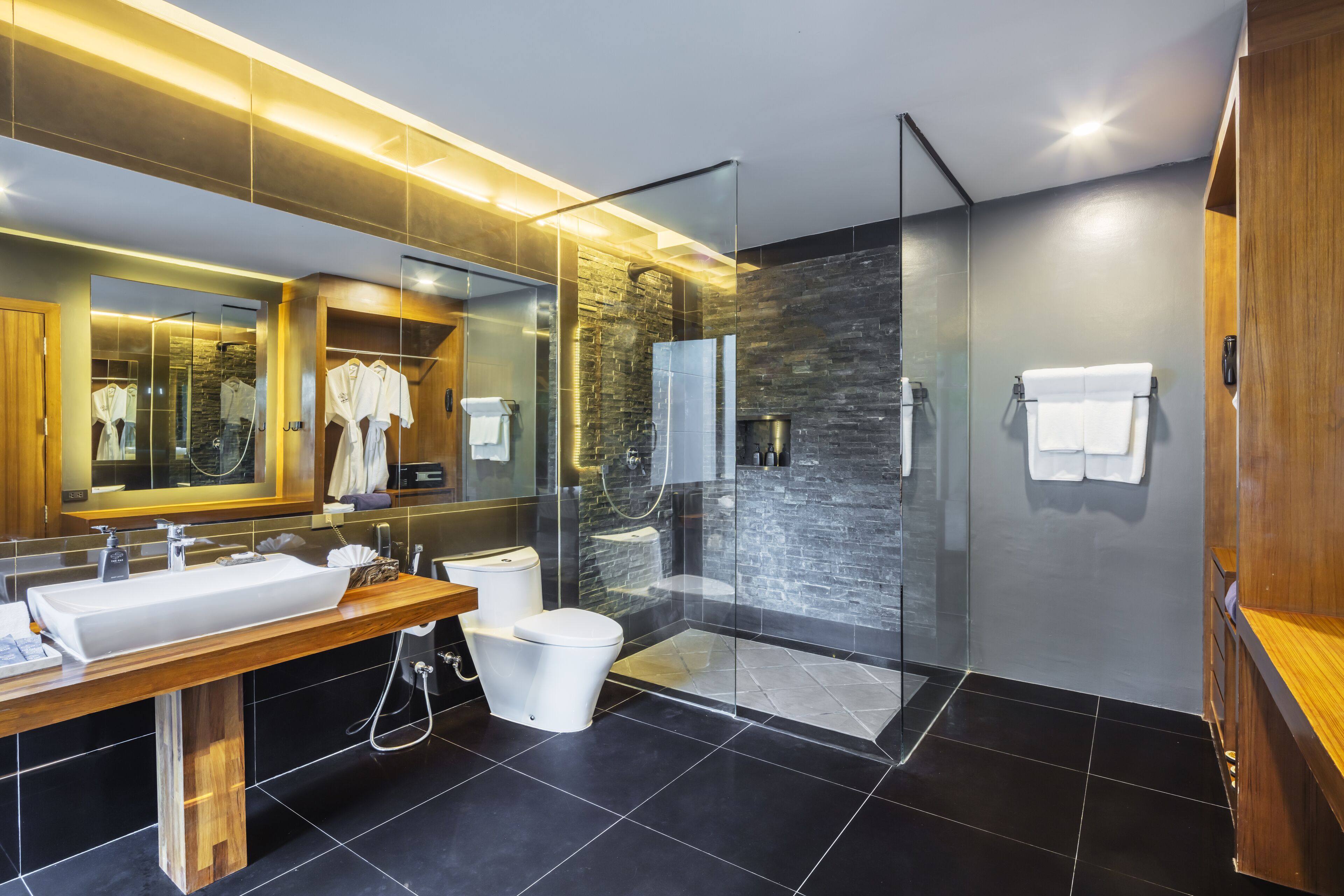 separate bathtub and shower, free toiletries, hair dryer, bathrobes