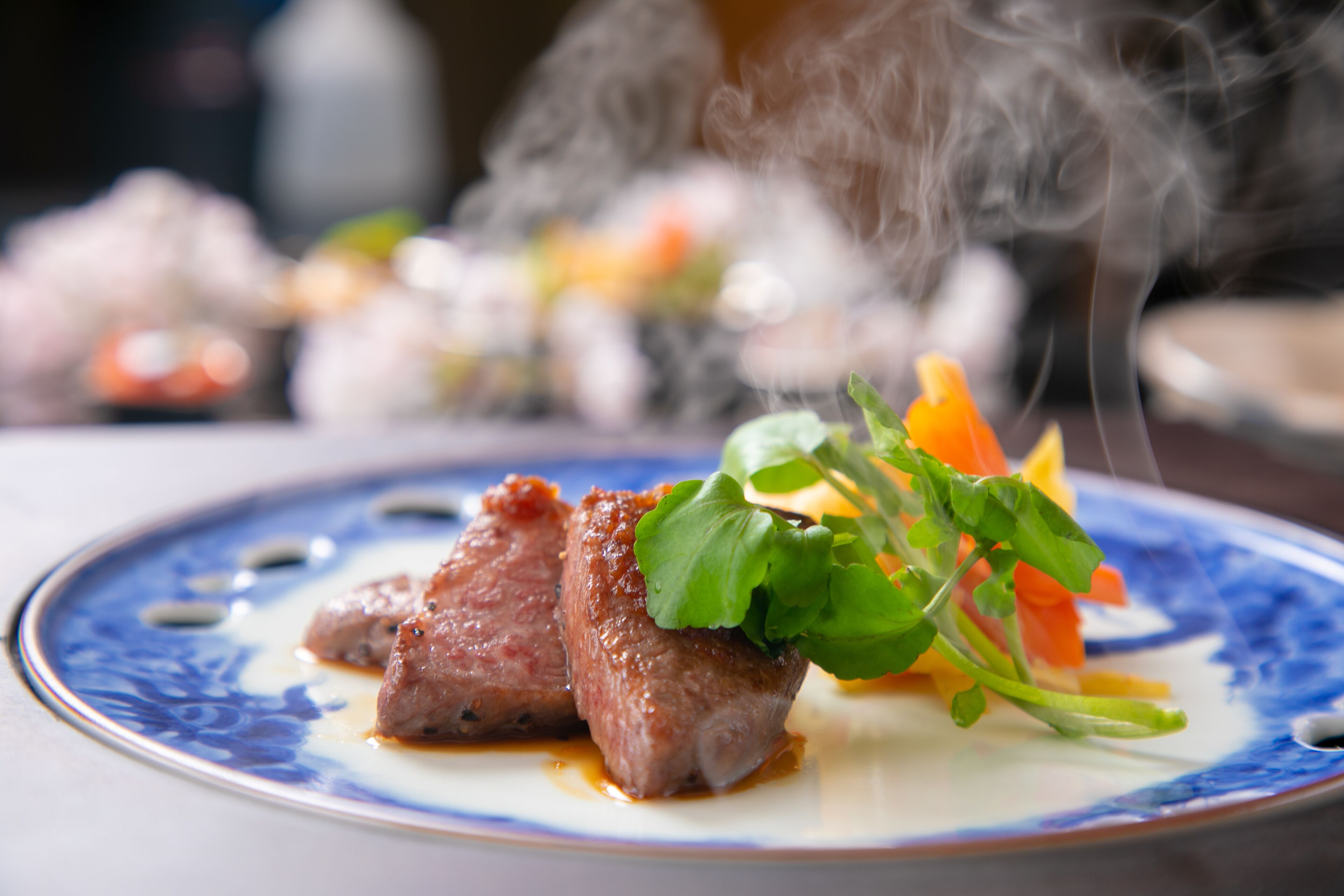 A plate of food with meat and vegetables.