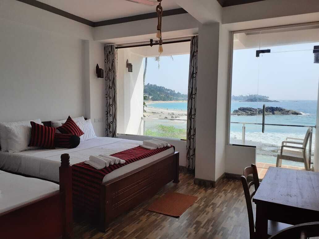 Chambre Triple Supérieure, 1 chambre, vue mer, en front de plage | Literie de qualité supérieure, bureau