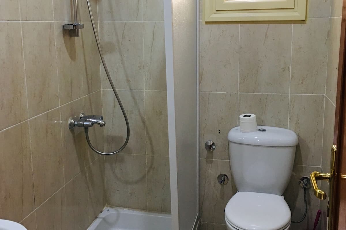 shower, towels, soap, shampoo