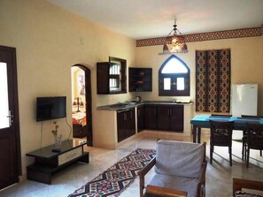 Apartment, 2 Bedrooms, Pool View | Living room | 50-cm flat-screen TV with satellite channels, TV - Nile Compound Hotel (Luxor)