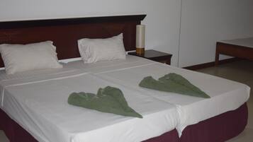 Desk, blackout curtains, soundproofing, rollaway beds