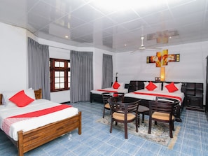 Family Room | Premium bedding, down comforters, desk, free WiFi