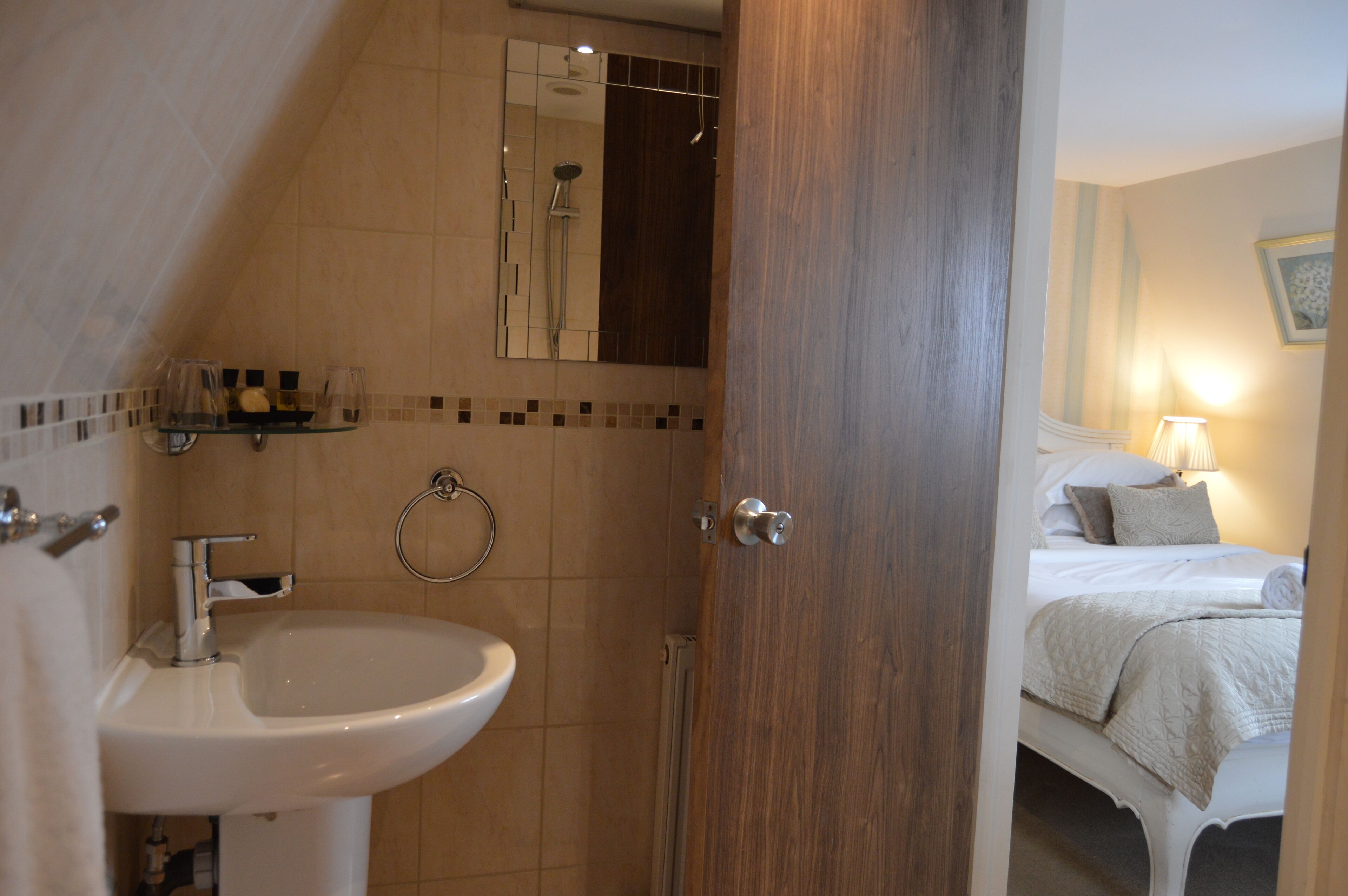classic room, 1 king bed | bathroom | free toiletries, hair dryer, slippers, towels