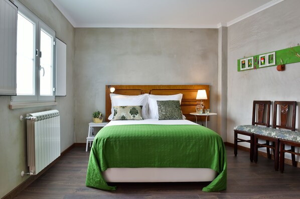 Premium bedding, desk, laptop workspace, blackout curtains