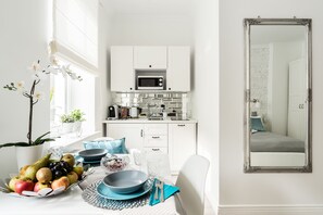 EstĂșdio | Cozinha americana privada | Geladeira, cooktop, cafeteira/chaleira, chaleira elĂ©trica