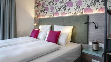 Superior-værelse til 4 personer | Premium-sengetøj, senge med topmadrasser, pengeskab på værelset