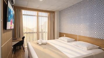 Habitación de lujo | Sábanas de algodón egipcio, ropa de cama de alta calidad, minibar