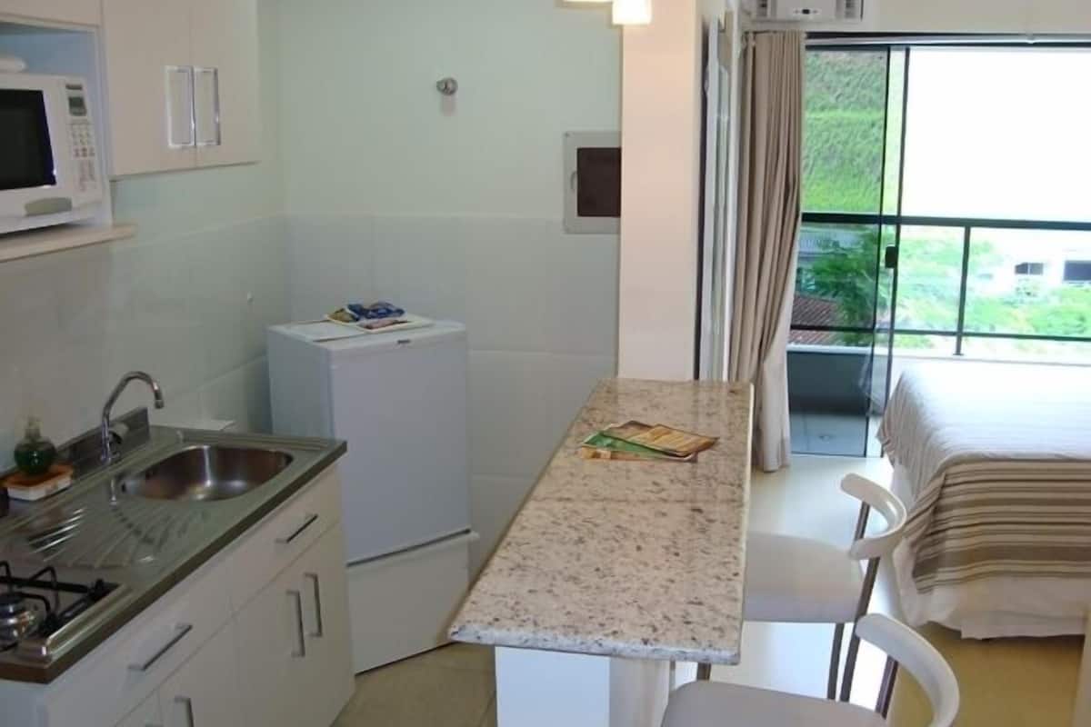 deluxe room | private kitchen | microwave, stovetop, high chair, cookware/dishes/utensils