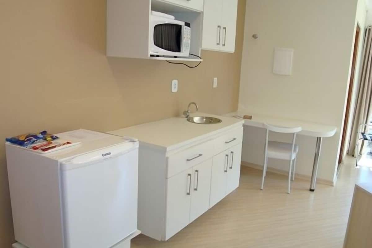 deluxe room | private kitchen | microwave, stovetop, high chair, cookware/dishes/utensils