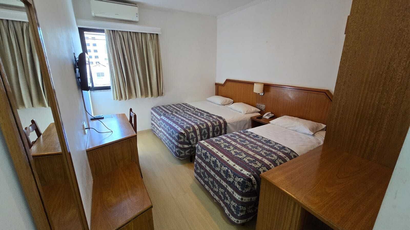 Standard Triple Room, Roll-in Shower | Minibar, in-room safe, desk, laptop workspace