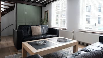 Apartment (De Inval) | Living area | Flat-screen TV, DVD player