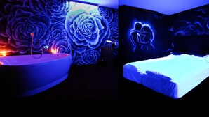 Quarto casal design, 1 cama de casal | Área de estar | TV de tela plana, filmes pagos