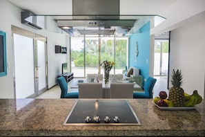 Apartment, 2 Bedrooms, Garden View (Acacia) | Private kitchen | Full-size fridge, microwave, stovetop, coffee/tea maker - Acacia Condos (Playa del Carmen)
