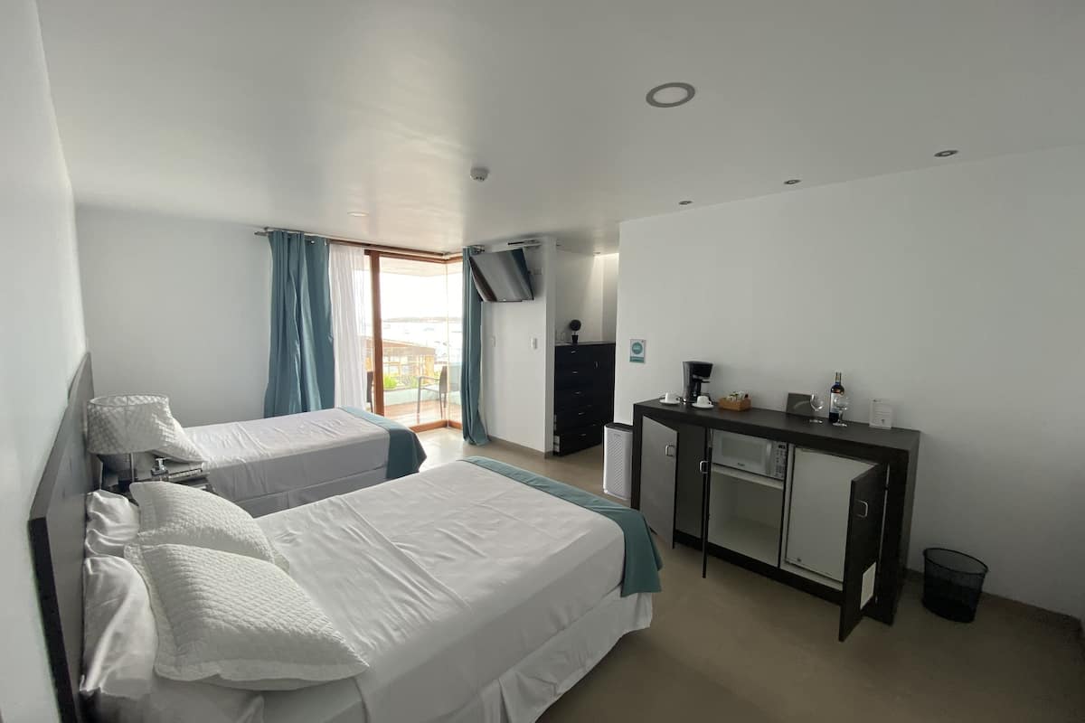 comfort room, ocean view | in-room safe, soundproofing, iron/ironing board, free cots/infant beds