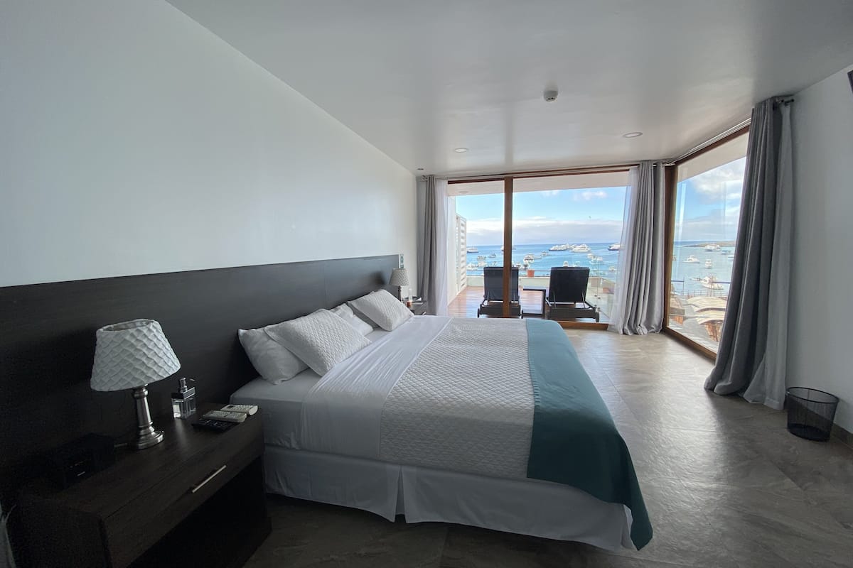 premium suite, 1 bedroom, ocean view | in-room safe, soundproofing, iron/ironing board, free cots/infant beds