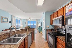 Condo | Private kitchen | Full-size fridge, microwave, oven, stovetop