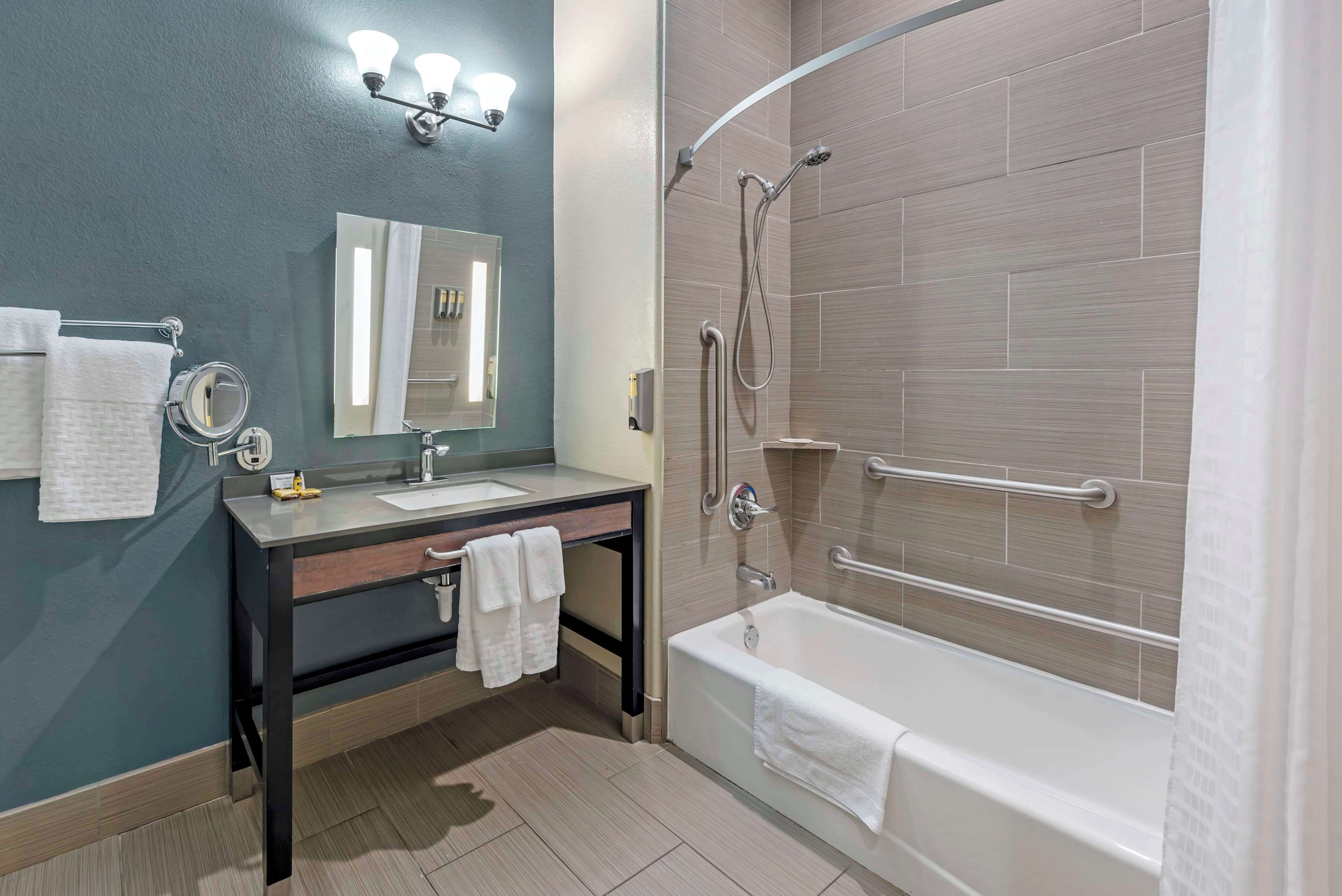 suite, 2 queen beds, accessible, bathtub (with sofabed) | bathroom | free toiletries, hair dryer, towels, soap