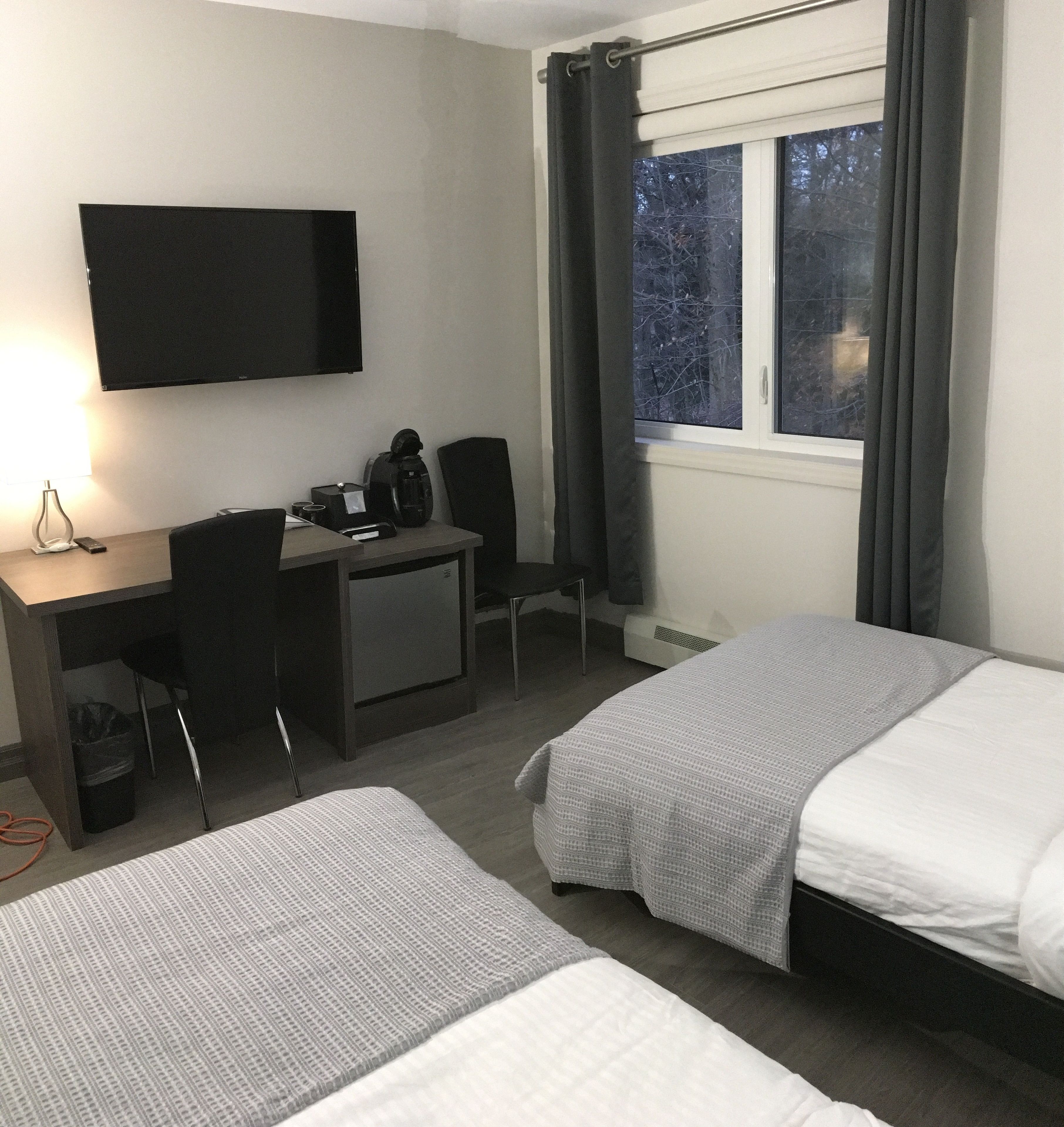 economy room | laptop workspace, soundproofing, iron/ironing board, bed sheets