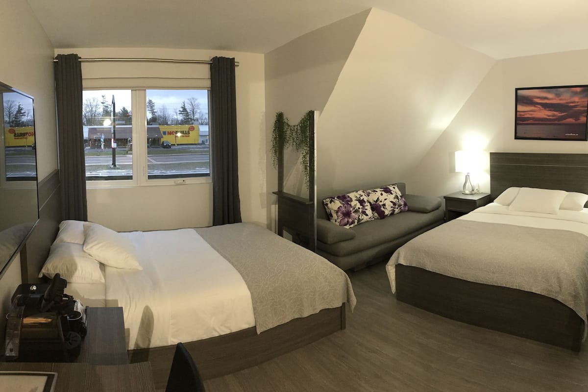 laptop workspace, soundproofing, iron/ironing board, bed sheets