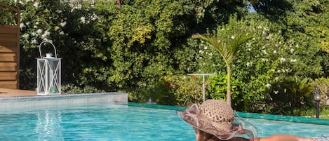 Outdoor pool, pool umbrellas, pool loungers
