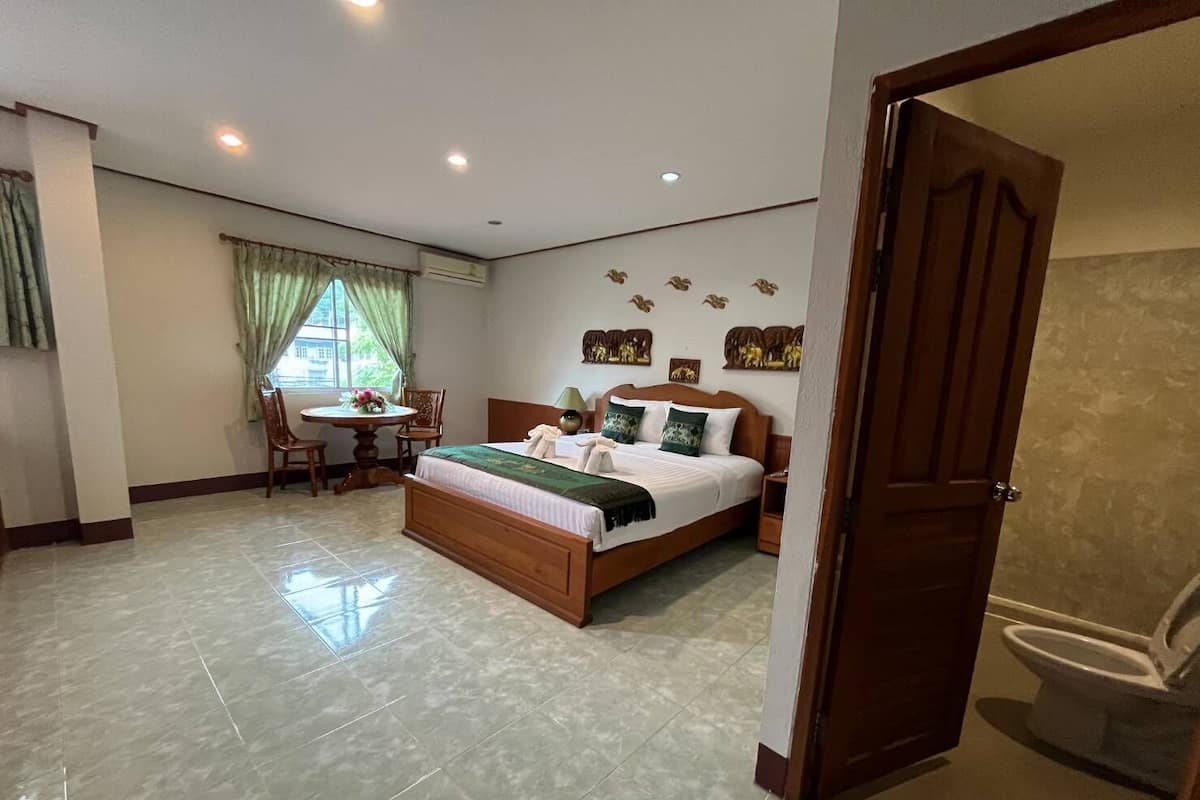 Habitación doble Deluxe | Camas extra y wifi gratis