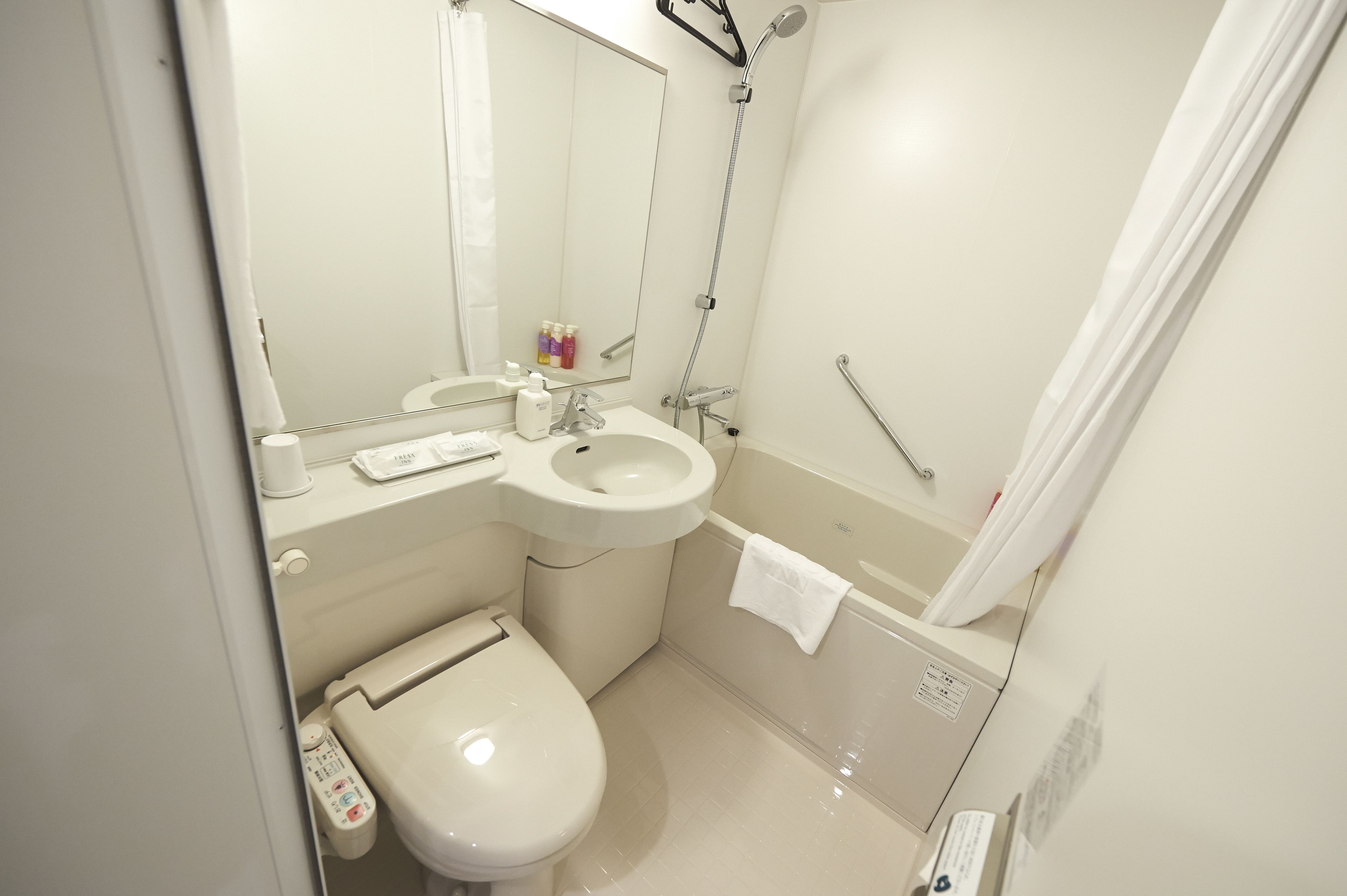 premium twin room, smoking | bathroom | combined shower/bathtub, free toiletries, hair dryer, slippers