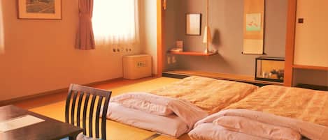 Traditional Quadruple Room | Desk, WiFi (free), bed sheets