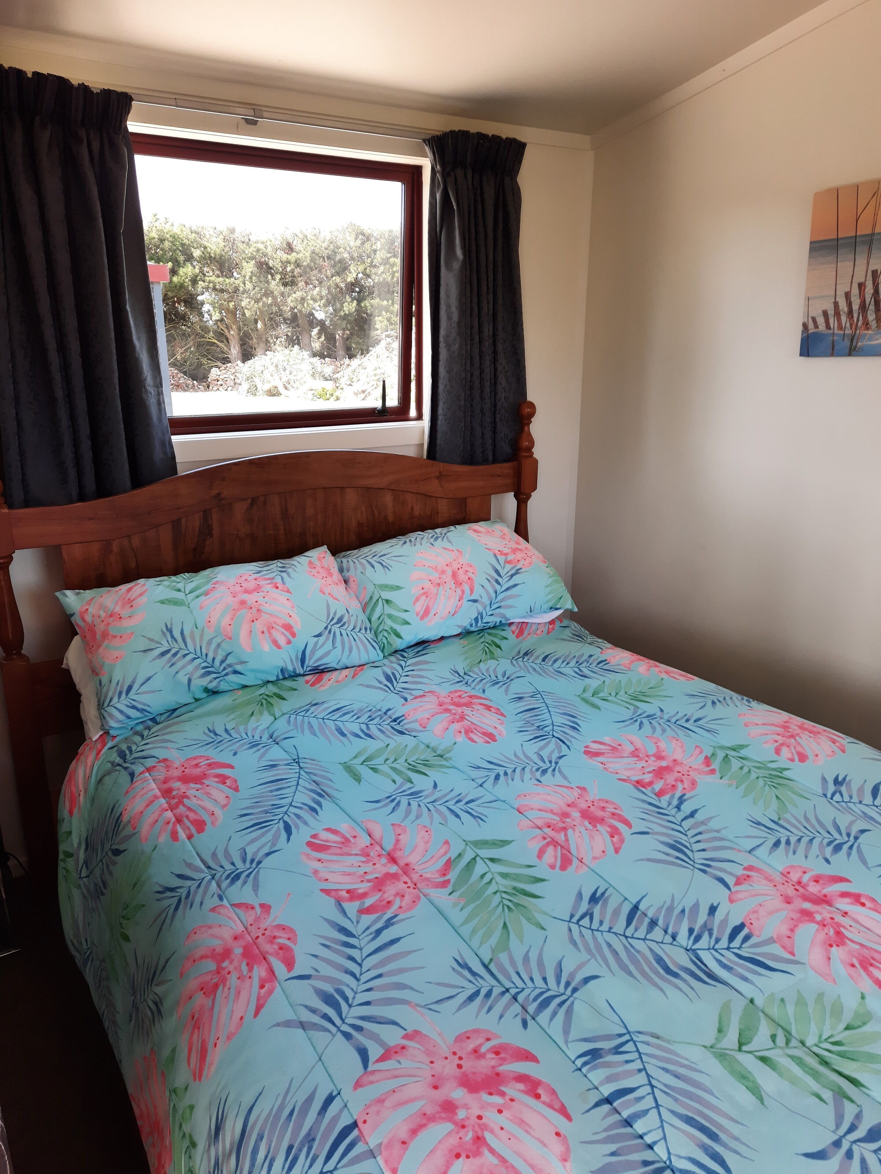 Premium bedding, blackout drapes, iron/ironing board, bed sheets