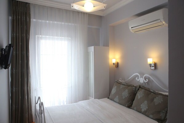 1 chambre, fer et planche à repasser, Wi-Fi gratuit, draps fournis