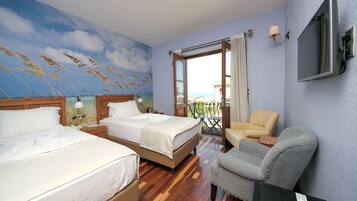 Twin Room, Balcony, Sea View | Minibar, in-room safe, desk, soundproofing