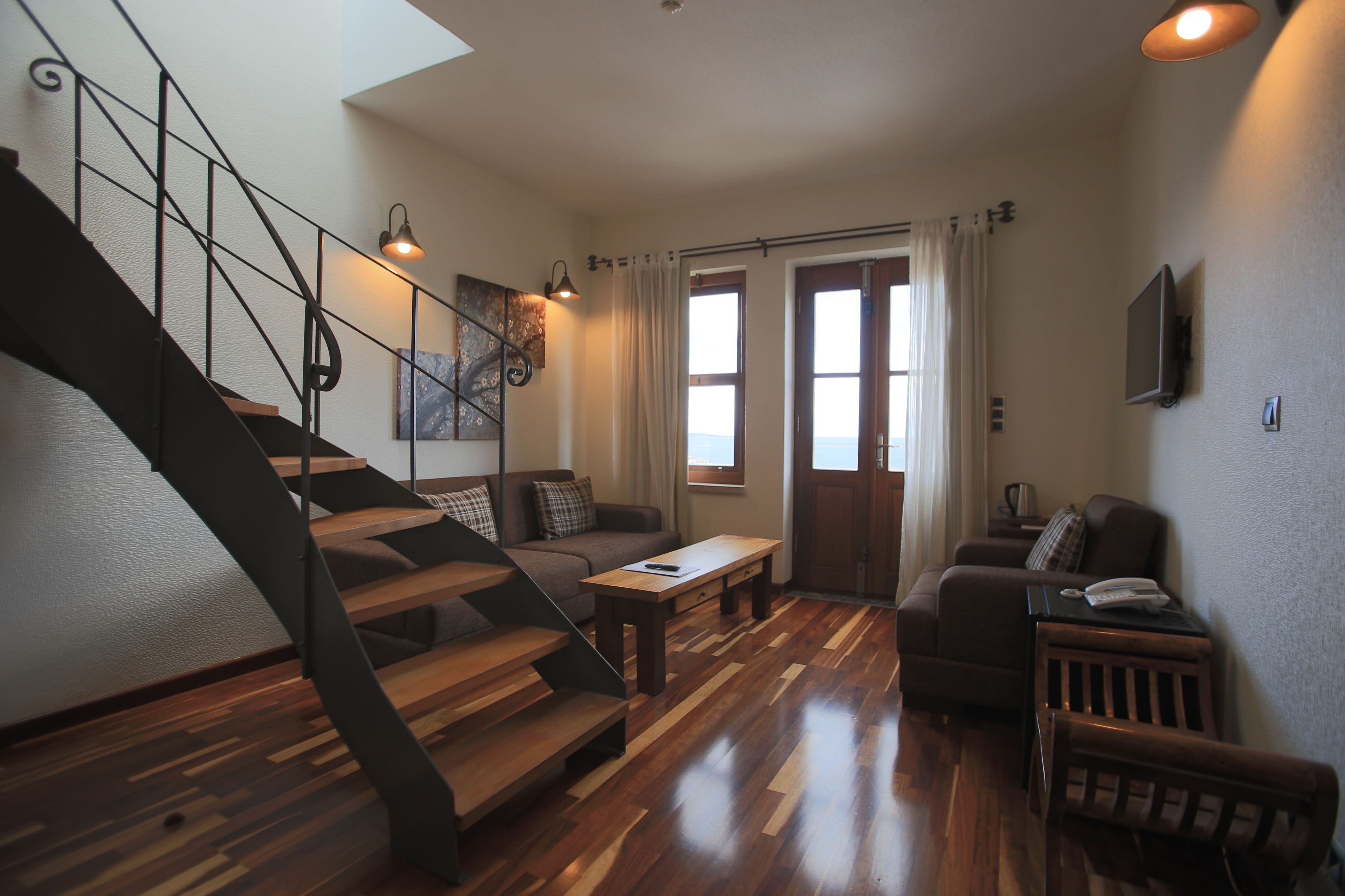 deluxe duplex, jetted tub, sea facing | living room | lcd tv