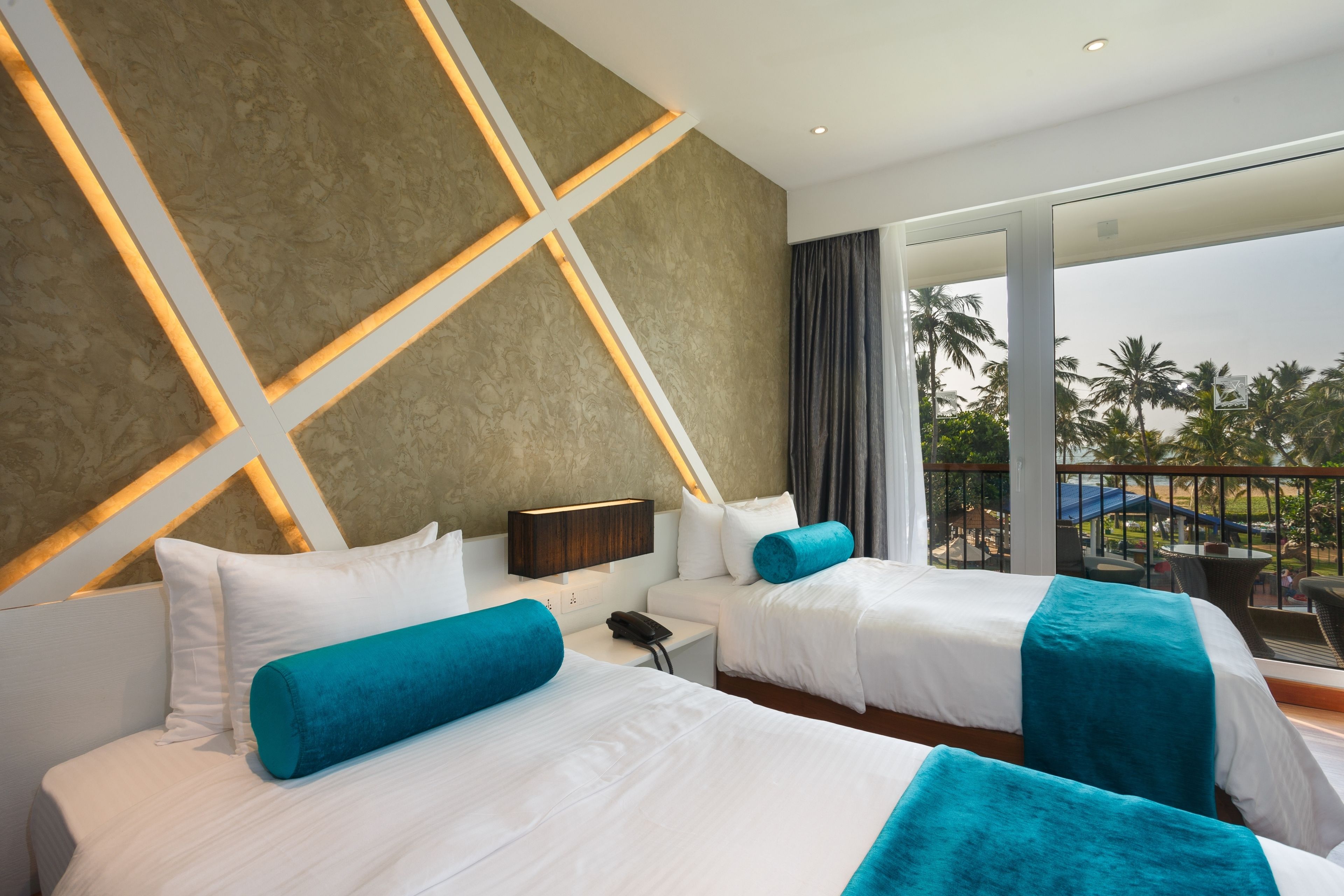 coastal deluxe balcony twin | egyptian cotton sheets, premium bedding, memory-foam beds, in-room safe