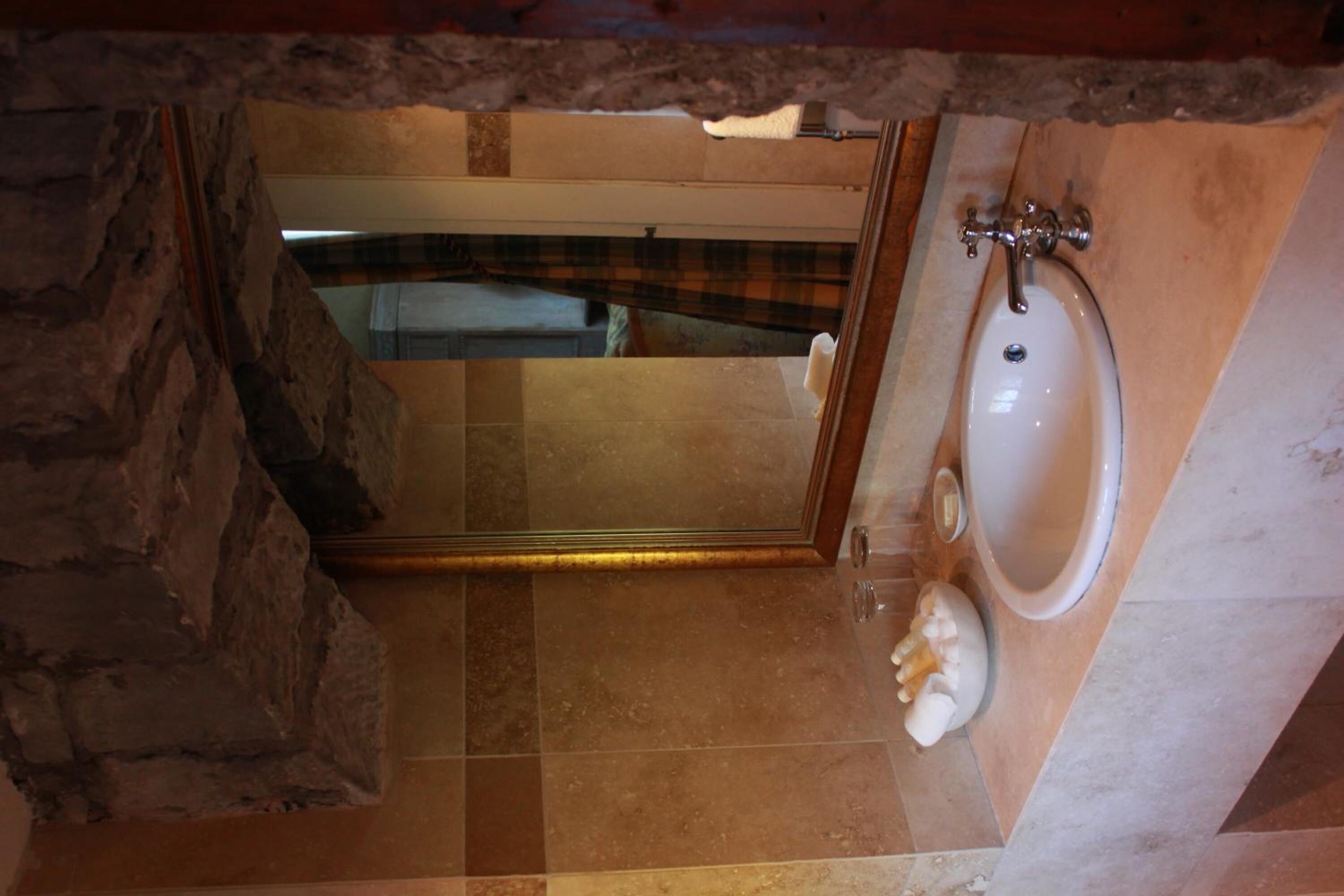 rainfall showerhead, designer toiletries, hair dryer, bathrobes